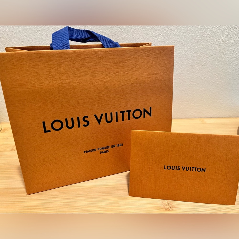 Authentic Louis Vuitton shopping bag and receipt holder
